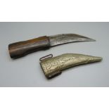 A Middle Eastern dagger with hardwood handle and scabbard, with inscription on the blade, 22cm