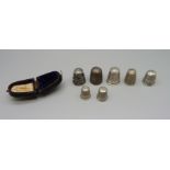 Four hallmarked silver thimbles, including one Charles Horner, three other thimbles and a vintage