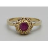 A 9ct gold, ruby and diamond cluster ring, 2.8g, P