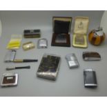 A collection of cigarette lighters, including Ronson Varatronic, cigarette case/lighter combination,