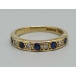 A 9ct gold, sapphire and diamond half-eternity ring, 2.5g, O