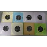 Sixteen original Beatles 7" singles and EP's