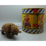 A Happynak tin-plate toy drum and a clockwork bear, (with key)