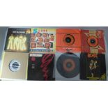 Twenty 1970's and 1980's rock 7" singles