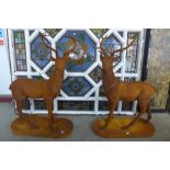 A pair of large cast iron stags