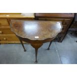 A burr walnut demi-lune hall table