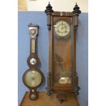 A 19th Century walnut Vienna wall clock and a George III mahogany banjo barometer