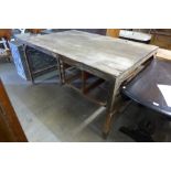 A large industrial steel framed work bench