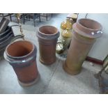 Three terracotta chimney-pots