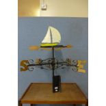 A wrought iron weather vane