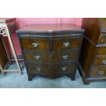 A George III style mahogany serpentine bachelor's chest of drawers