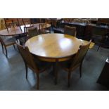 A G-Plan Fresco teak extending dining table and four chairs