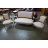 A French style beech and fabric upholstered three piece salon suite