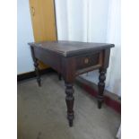 A Victorian pitch pine kitchen table