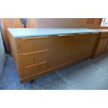 A painted teak sideboard