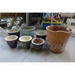 Seven assorted plant pots