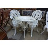 A painted cast alloy garden table and two chairs