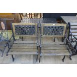 A cast iron garden table and two chairs