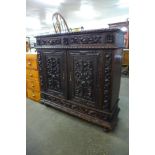 A 19th Century Portuguese carved oak cupboard