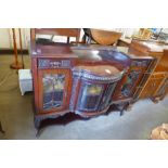 An Edward VII carved mahogany side cabinet