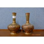 A pair of small copper plated brass vases
