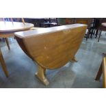 An elm and beech drop-leaf dining table