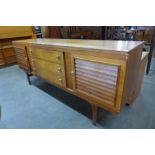 An Elliotts of Newbury teak sideboard