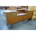 A small teak sideboard