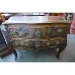 A 19th Century French provincial fruitwood bombe commode