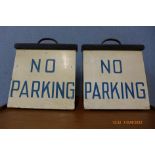 A pair of vintage painted wooden No Parking signs