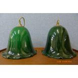 A pair of Art Deco green glass hanging light shades