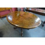 A Victorian walnut tilt-top breakfast table