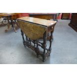 An early 20th century small oak gateleg table