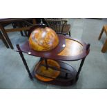 A terrestrial globe cocktail cabinet/trolley