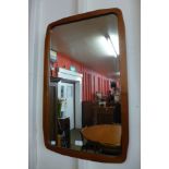 A teak framed mirror