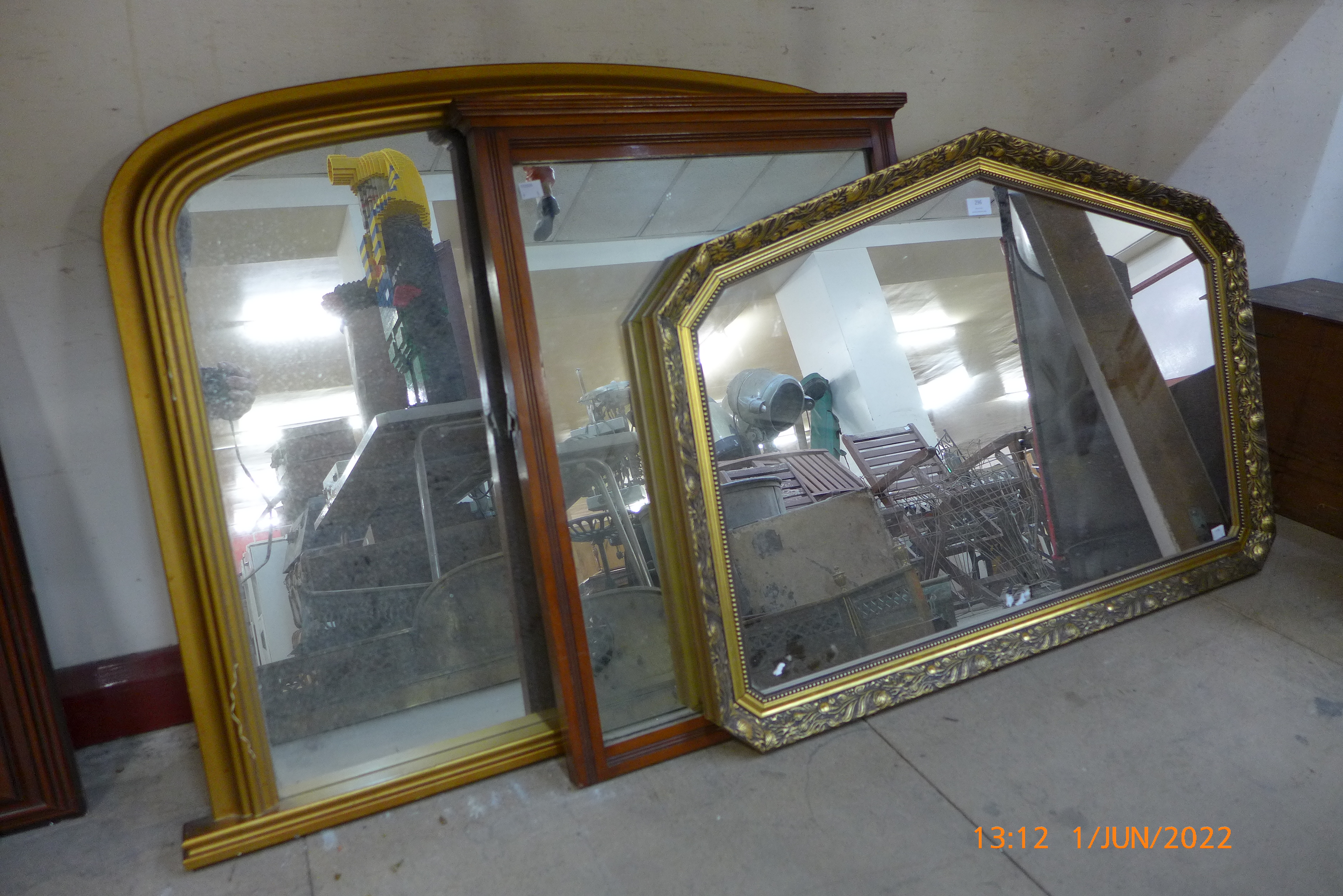 Two gilt framed mirrors and a mahogany framed mirror