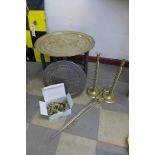 An eastern brass topped folding occasional table, pair of brass barley twist candlesticks, etc