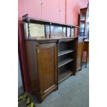 A Victorian Aesthetic Movement walnut breakfront bookcase