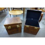 A pair of brown leather boxes
