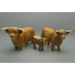 A Beswick Highland cattle family group, one horn a/f