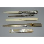 A Victorian silver handled letter opener, Birmingham 1891, a letter opener/pencil holder combination