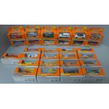 Twenty-nine orange box Matchbox Mattel Wheels die-cast model vehicles (collected by the vendor