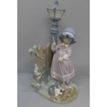 A large Lladro figure, Fall Clean-Up, 32.5cm