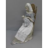 A large Lladro figure, Embroiderer, 29.5cm