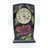 A Moorcroft Anemone clock, 15cm