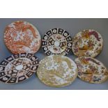 Six Royal Crown Derby plates; two Old Avesbury, two 2451 pattern, one Red Aves and one Gold Aves