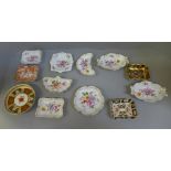 A collection of eleven Royal Crown Derby pin trays and an Abbeydale dish