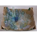 A collection of glass advertising bottles and apothacary rods **PLEASE NOTE THIS LOT IS NOT ELIGIBLE