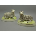A pair of Staffordshire sheep figures