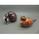 Two Royal Crown Derby paperweights, a badger and pheasant, both with stoppers